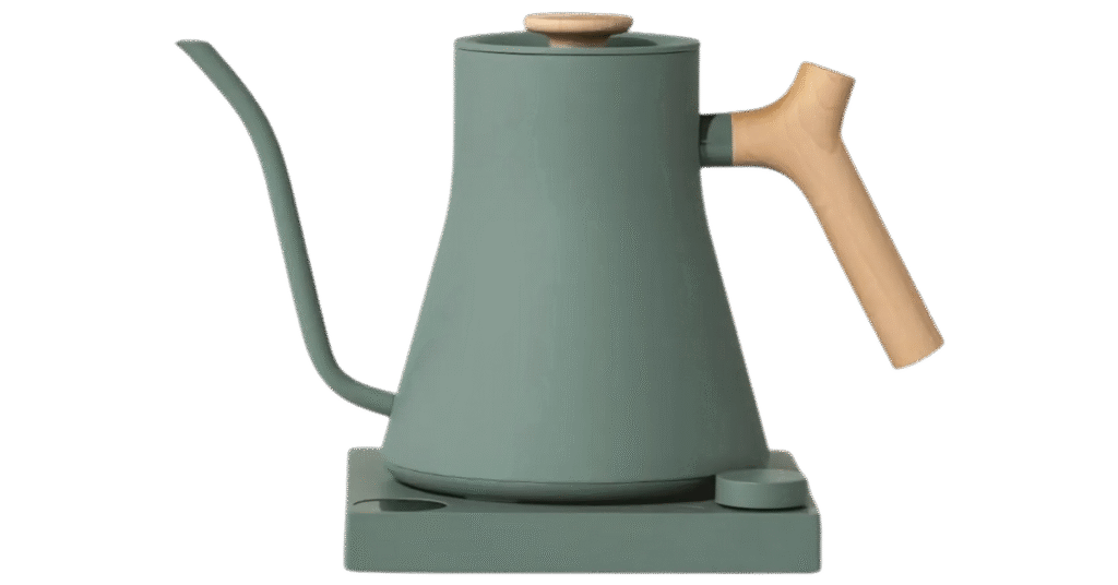 A white electric gooseneck kettle with a digital screen on a modern kitchen counter.