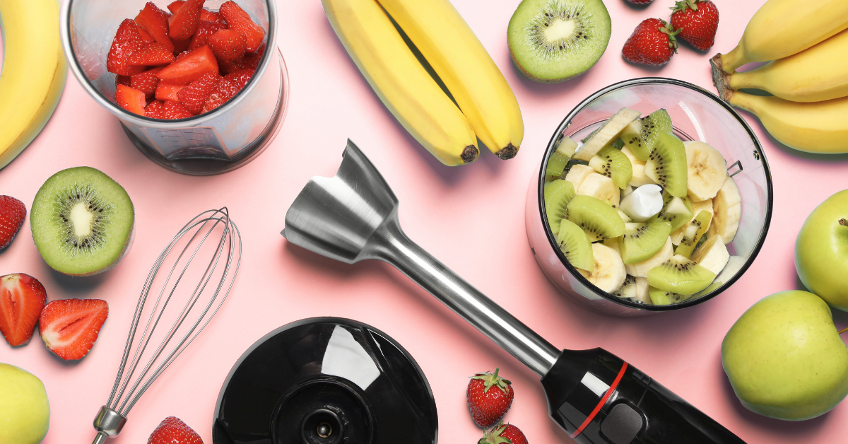 The 1100W model, our top pick for best hand blender with attachments, making a creamy juice